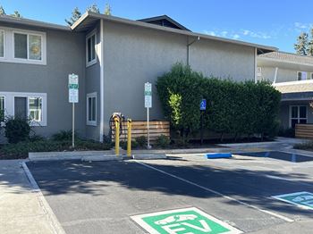Electric vehicle chargers in the parking lot of the property at Pleasanton Glen Apartments, Pleasanton, 94566